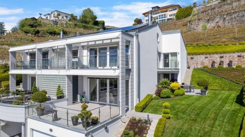 Élégante propriété contemporaine avec vue panoramique sur le Léman
